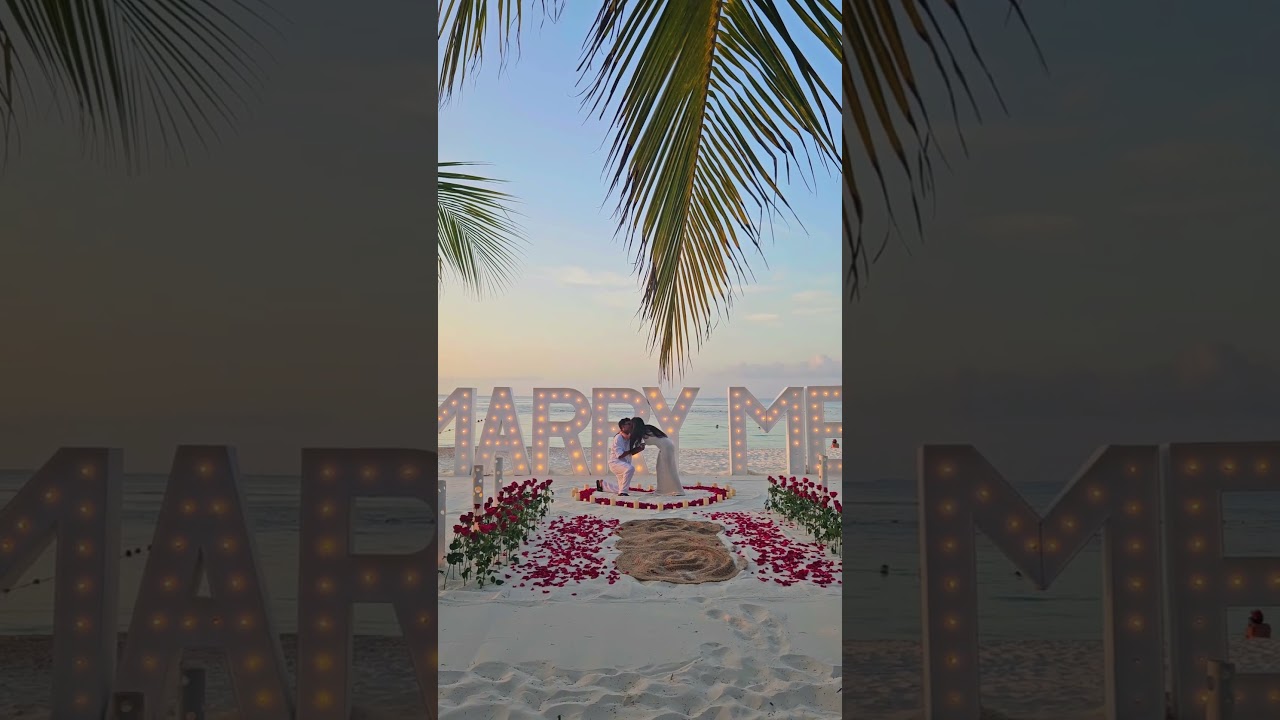 Read more about the article “Roses beneath us, sunsets above us, and love all around.”🌹🌅 #cancunproposal #proposalplanner