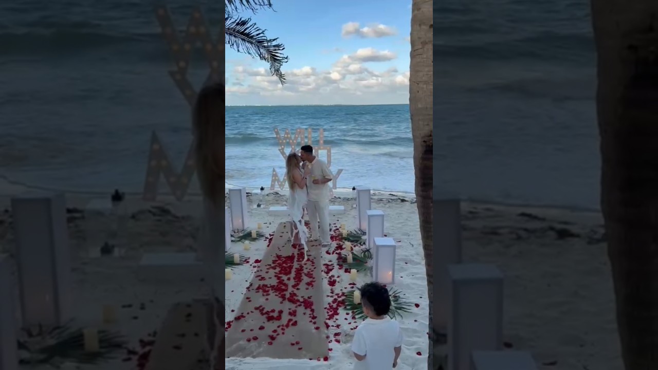 Read more about the article With their son front row for the sweetest moment, he asked her to make their family official #cancun